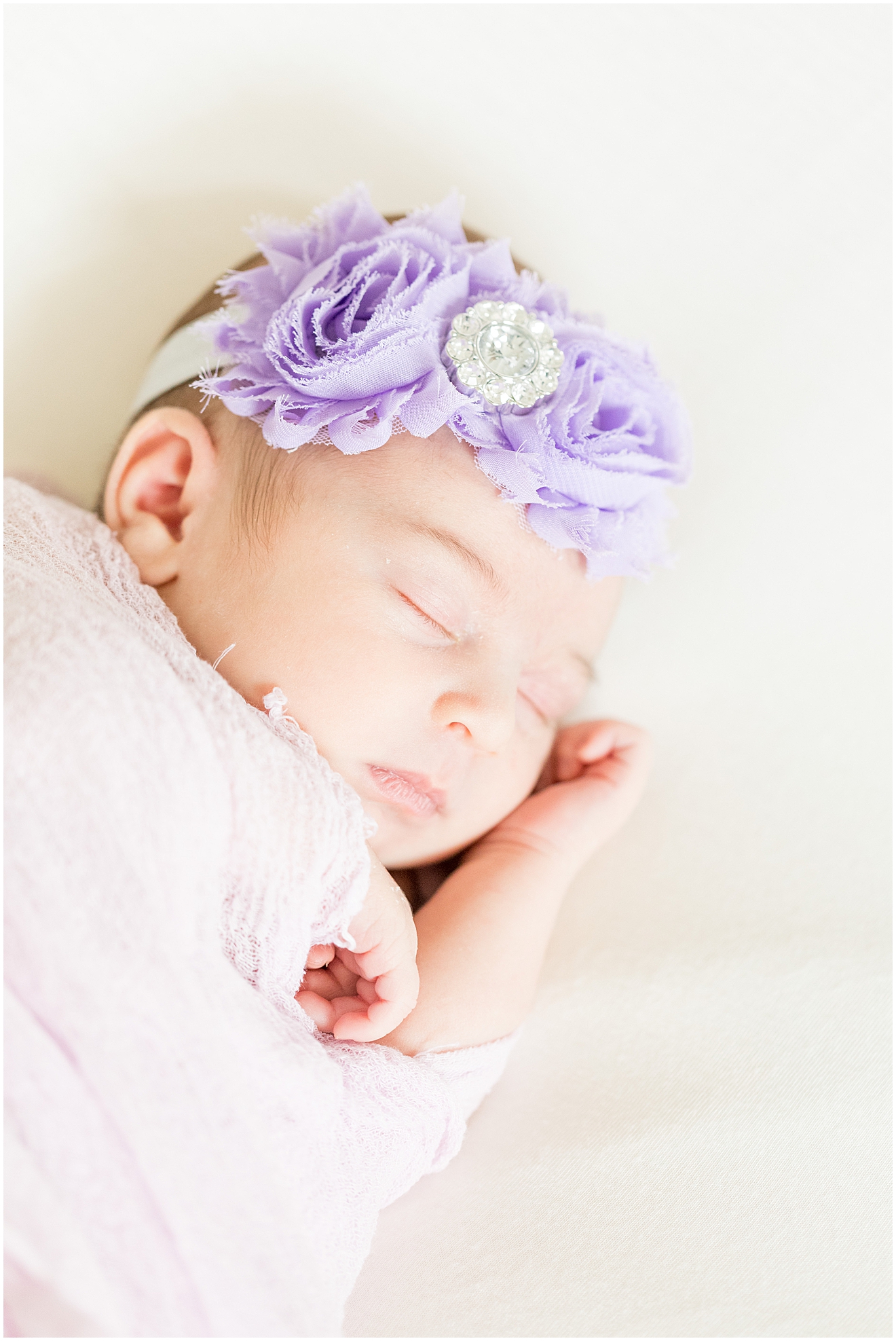 newborn-photos-with-purple-headband