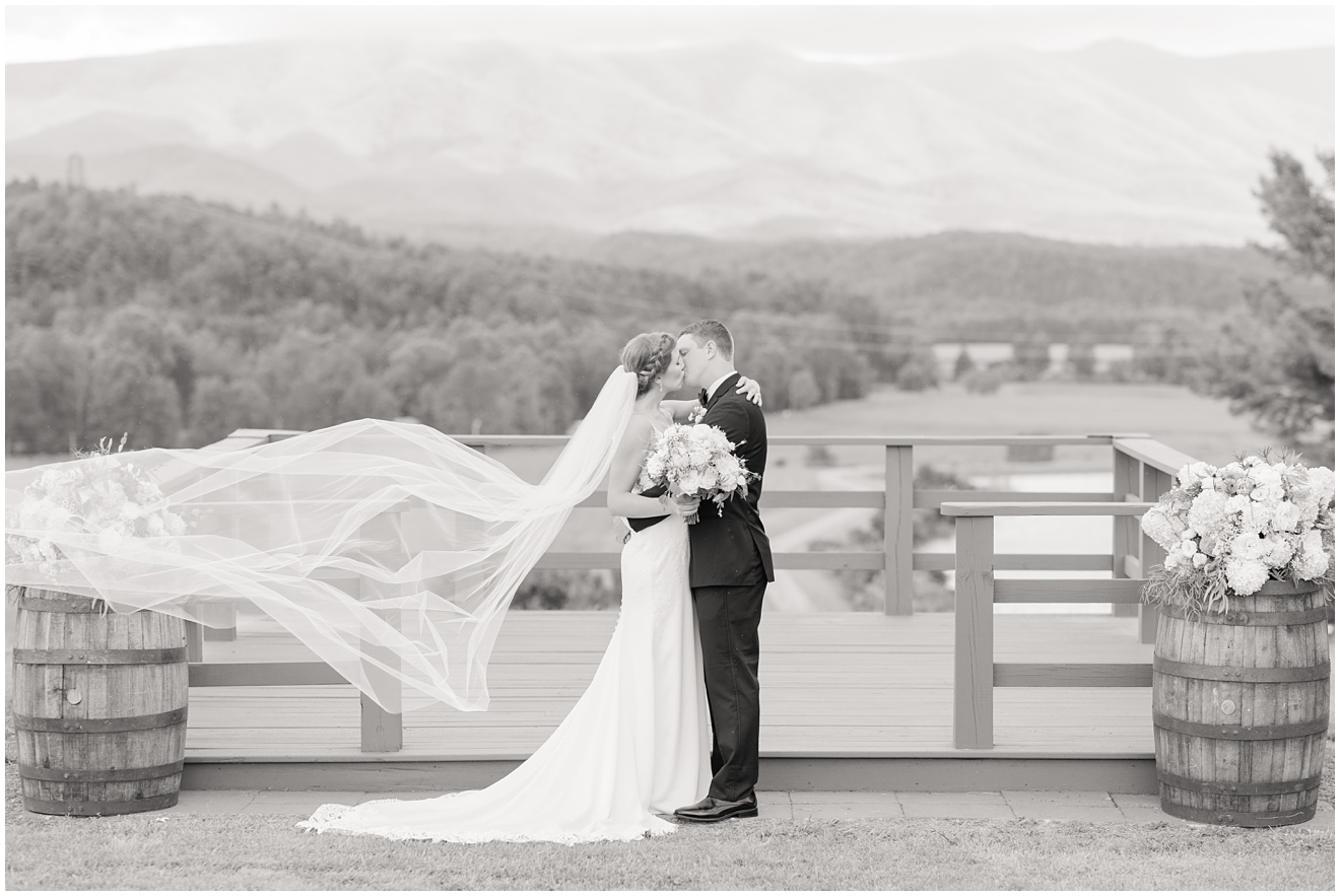 black-and-white-bride-and-groom-portrait-with-mountain-background